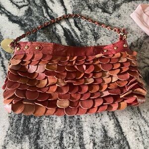 Jesslyn Clark bag.   12 x 6.5 fully lined with zippers and inside pouch.